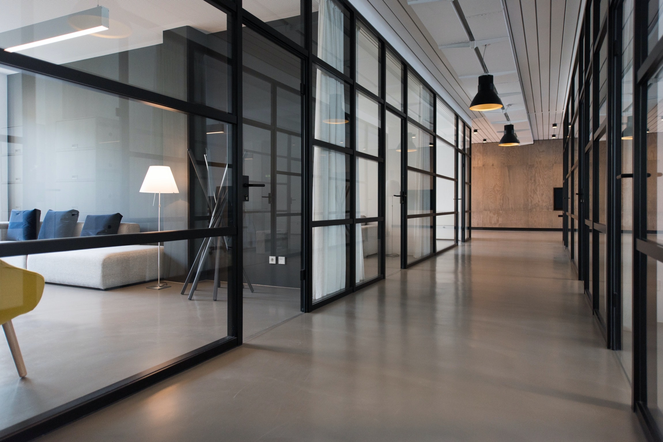 Corporate industrial office hallway with windows